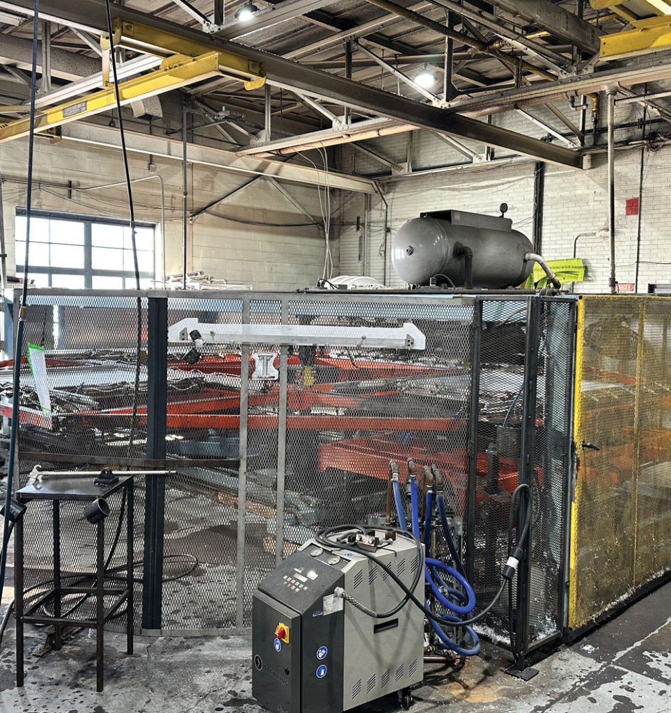 A vacuum forming machine at the Cooper Plastics manufacturing facility