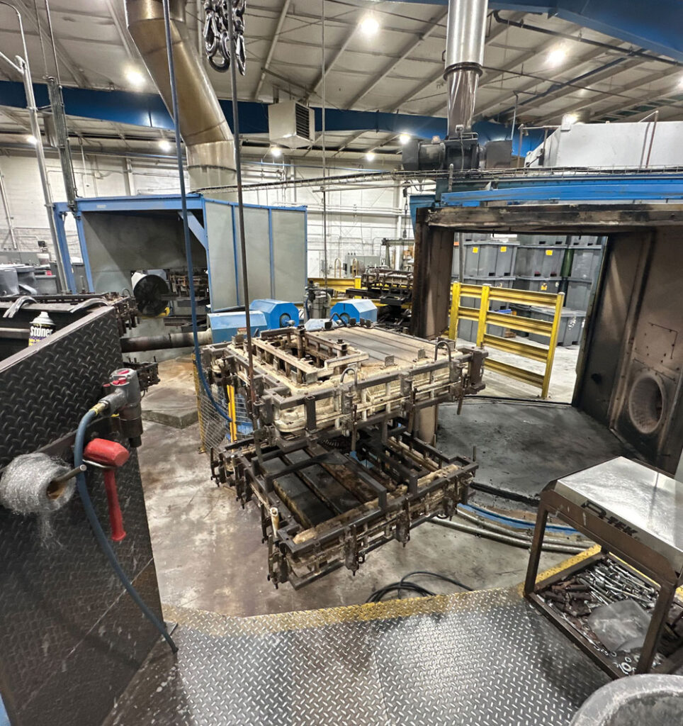 A rotational molding machine at the Cooper Plastics manufacturing facility